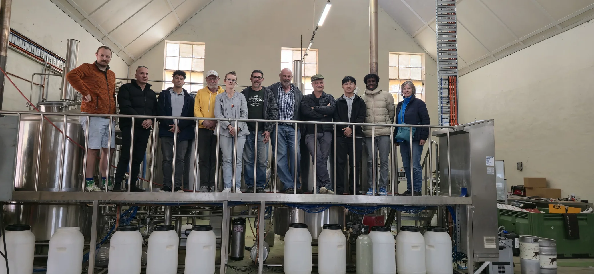 A group visiting an industrial facility